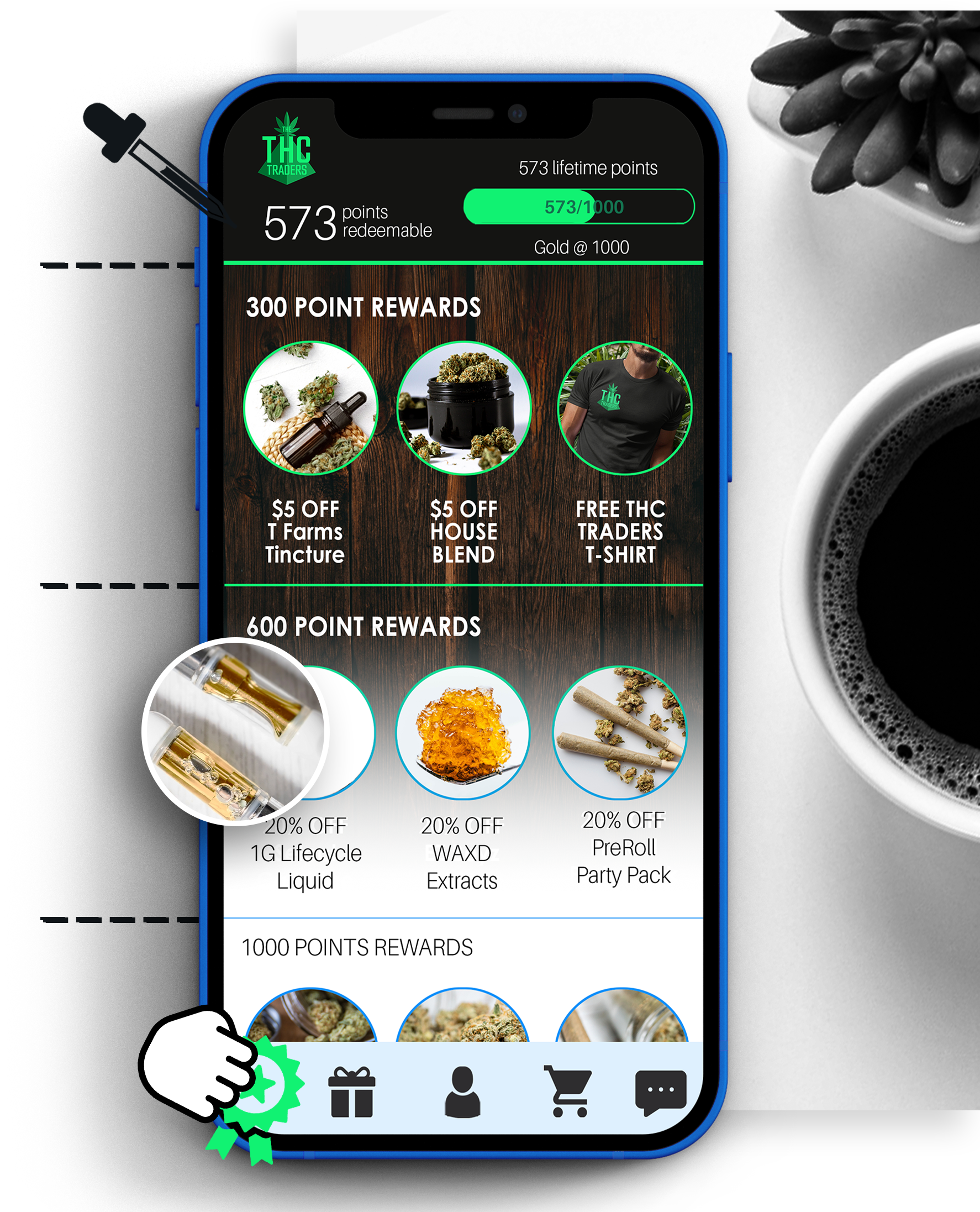 Springbig app on iPhone next to cup of coffee